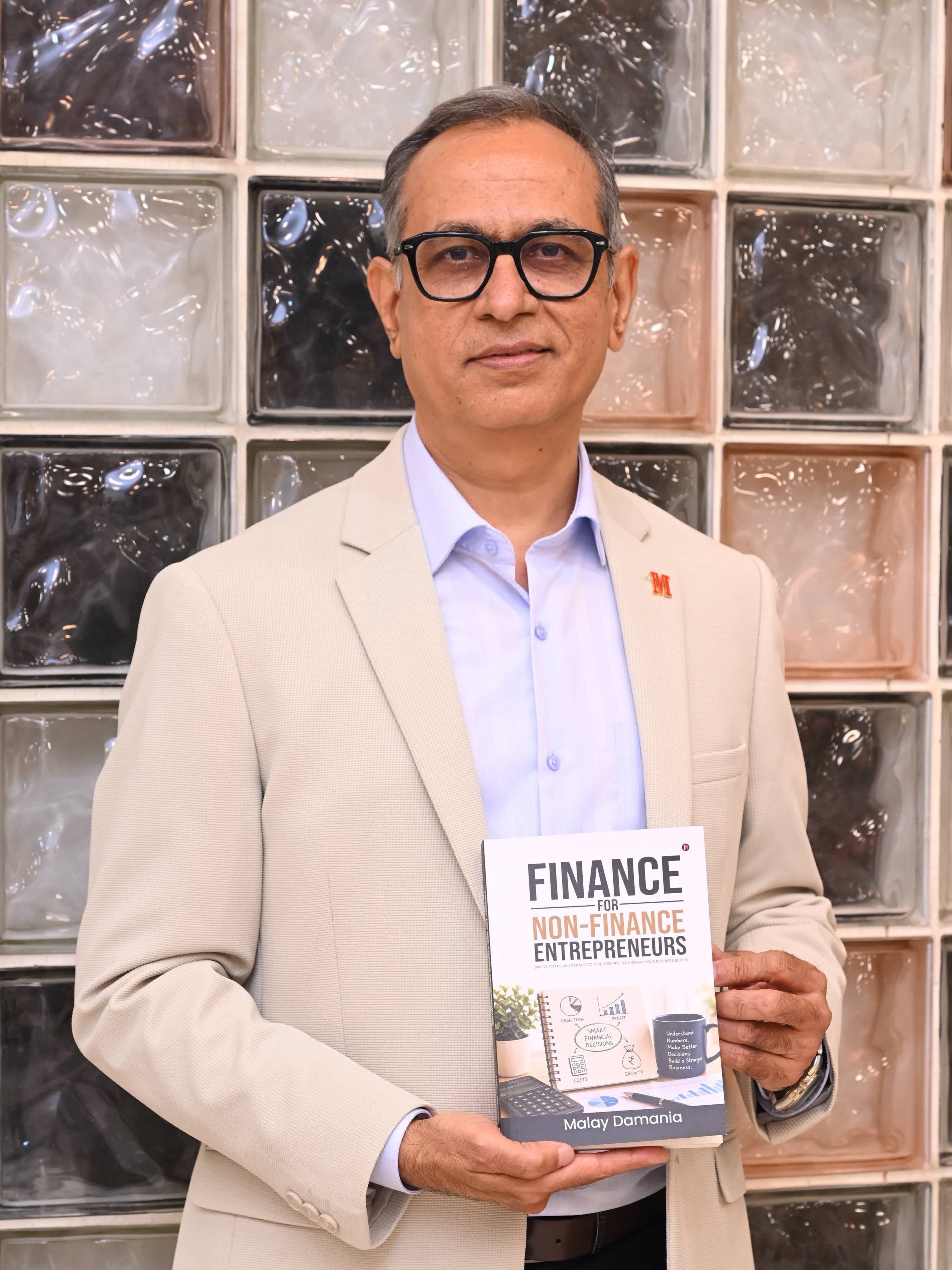 Malay Damania reading Business Champ